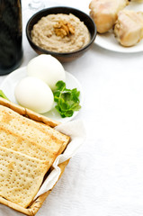 Matzah, wine, eggs, chicken, greens and haroset