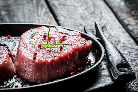 Roasting Fresh Piece Of Red Meat With Rosemary