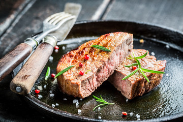Hot roasted beef with fresh herbs ready to eat