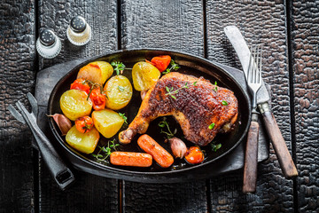 Roasted chicken leg with herbs and spices