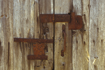 old wooden door with locks