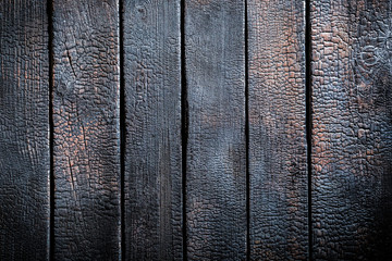 Black burnt wooden table