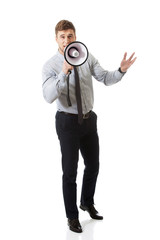 Fototapeta premium Businessman shouting through megaphone.