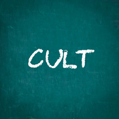 CULT written on chalkboard