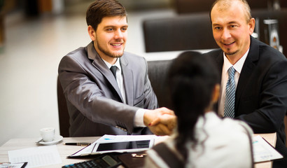 Business people shaking hands
