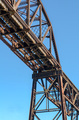 Steel Girder Railroad Bridge with Blue Sky.