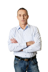 Portrait of handsome man with folded arms