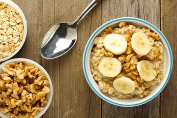 Banana walnut overnight oatmeal in a bowl on wood table
