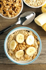 Banana walnut overnight oatmeal in a bowl on wood table