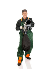 Fototapeta premium Worker in uniform with a leaf blower