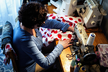 Middle aged woman sewing
