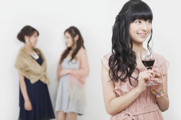 Obraz na płótnie Canvas ワインを持つ女性