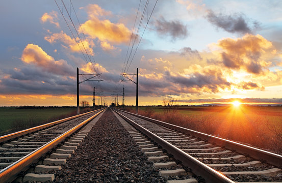 Fototapeta Railroad at sunset
