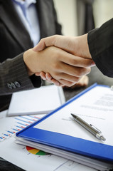 Closeup of business people shaking hand