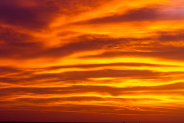 Naklejka premium Fiery orange sunset sky. Beautiful sky.