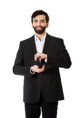 Businessman showing the size with hands.