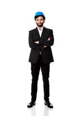 Handsome engineer in protective helmet.