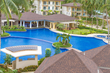 beautiful water pool in tropical hotel, summer vacation image