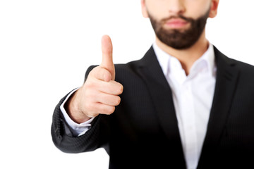 Businessman pointing his finger on you.