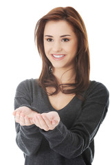 Woman holding something imaginary on hands