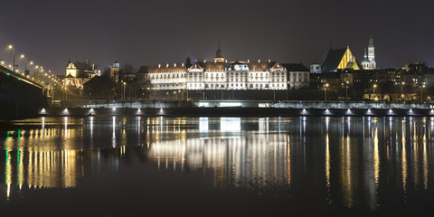 Fototapeta na wymiar Panoramic view of Warsaw waterfront by night, Poland.