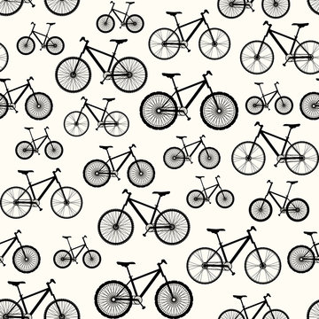 Different bicycles on light background.