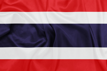 Thailand - Waving national flag on silk texture