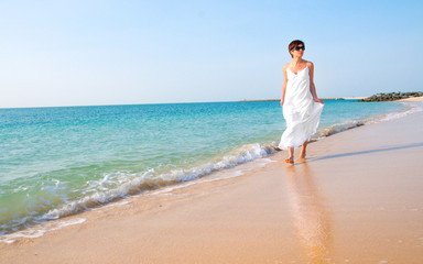 brunette woman on beach