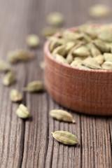 Green cardamom super food ayurveda asian aroma spice in a wooden