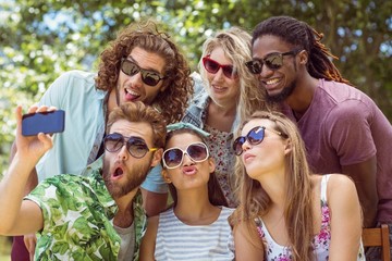 Happy friends taking a selfie