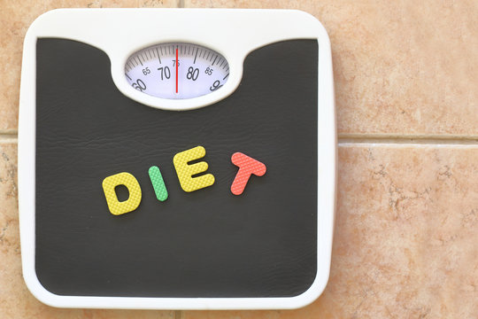 Bathroom scale with Diet text. Diet concept