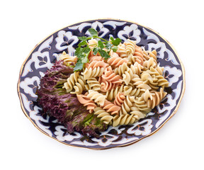 Penne pasta with sauce, cheese and basil, selective focus