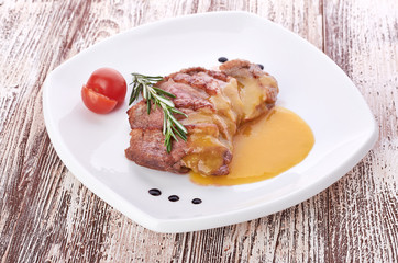 Beef steak medium grilled, isolated on white background