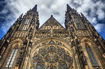 Fototapeta na wymiar Gothic facade above the entrance to St Vitus Cathedral, Prague, 