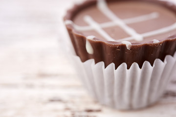 Dark chocolate on wooden background