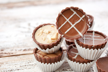 Dark chocolate on wooden background