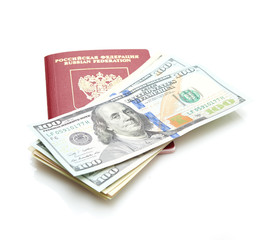 Russian passport with American dollars