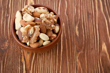 Mix nuts  on wooden  background
