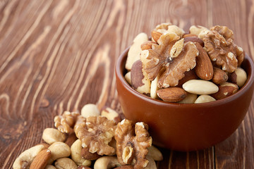 Mix nuts  on wooden  background