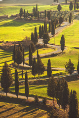 Panele Szklane  Spring wonderful landscape of Tuscany, green fields, sunrise and