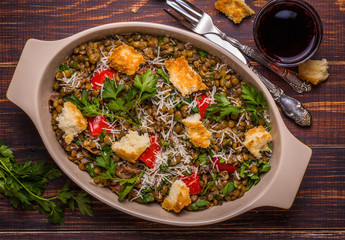 Stewed lentils with bacon, peppers and croutons