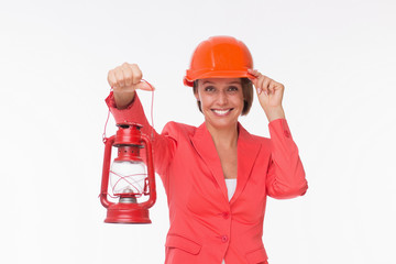 Business woman in helmet with red lamp