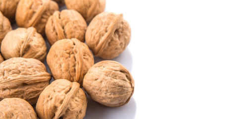 Walnut nuts over white background