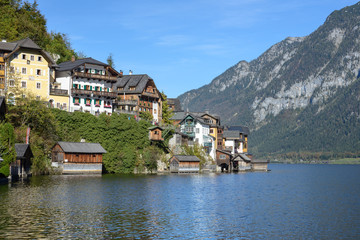 Fototapeta premium View of famous old town Hallstatt village in Alps at sunny day, Salzkammergut, Austria