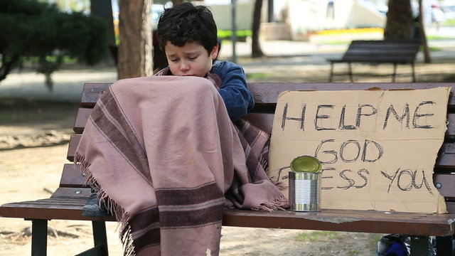 Homeless child begging