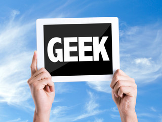 Tablet pc with text Geek with sky background