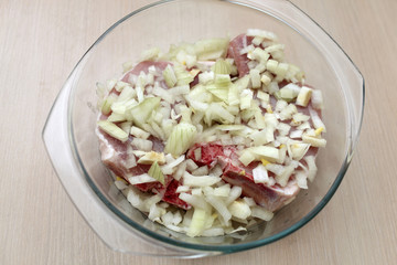 Raw pork with onions