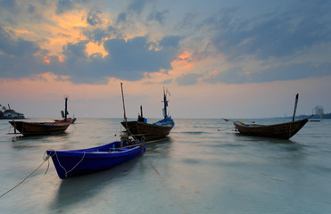 Fototapeta na wymiar The fishing boat with a beautiful sunset, Thailand
