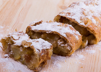 Apple strudel with powdered sugar vanilla