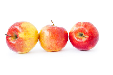 juicy red apples isolated on white
